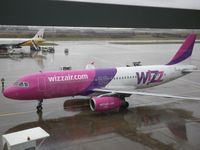 HA-LPC @ EGGW - Taken on a wet February morning at Luton whilst waiting to fly to Cyprus - by Steve Staunton