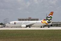 VP-CKZ @ MIA - Caymen 737-300 - by Florida Metal