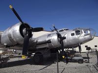 N3713G @ KCNO - Boeing B-17G Flying Fortress under restoration at the Planes of Fame Museum, Chino CA