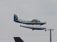 N77TF @ MIA - Cessna 208 on floats - by Florida Metal