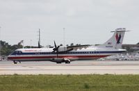 N447AM @ MIA - Eagle ATR 72 - by Florida Metal