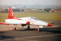 70-3027 @ EGVA - NF-5A Freedom Fighter of 134 Filo of the Turkish Air Force's Turkish Stars display team on the flight-line at the 1996 Royal Intnl Air Tattoo at RAF Fairford. - by Peter Nicholson