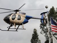 N108PP - Ship passing Old Glory as she settles down onto the street - by Helicopterfriend