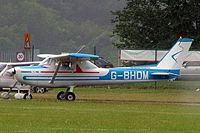 G-BHDM @ EGBP - R/Cessna F.152 [1684] Kemble~G 01/07/2005.Taken in rain. - by Ray Barber