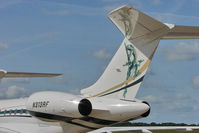 N313RF @ EGGW - Tail logo on 2006 Bombardier BD-700-1A10, c/n: 9194 at Luton - by Terry Fletcher