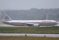 N348AN @ LSZH - waiting for his turn on rwy 18 - by Raybin