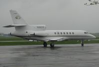 N102TF @ KAXN - Dassault Falcon 50 taxiing to runway 13 for departure.