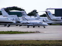 N60LW @ EGGW - Cessna 550 on a packed apron at Luton - by Chris Hall