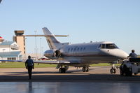 N800RC @ KCID - Pushing out of the Collins hangar
