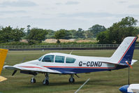 G-CDND @ EGHR - Sitting in the parked area - by John Richardson
