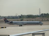 N908FJ @ PHX - Taxiing for take off at runway 25R - by Helicopterfriend