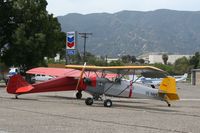 N1936 @ KAJO - Parked with Taylorcraft NC27598 at the East end of the field.