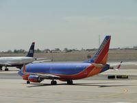 N623SW @ PHX - Taxiing for take off at runway 25R - by Helicopterfriend