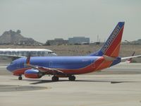 N233LV @ PHX - Taxiing for take off at runway 25R - by Helicopterfriend