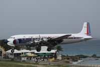 N836D @ TNCM - N836D over the Maho at TNCM on a rainy day!!! - by Daniel Jef