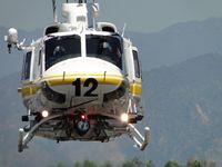 N120LA @ POC - Headed straight at me while turning around at LA County helipad area - by Helicopterfriend