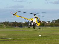 VH-HYD @ YMMB - Schweizer 269C VH-HYD departing the heliport at Moorabbin - by red750