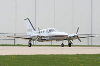 N464SF @ KDPA - BULLOCK INVESTMENTS LLC, Cessna 421C on the ramp at KDPA. - by Mark Kalfas