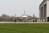 N464SF @ KDPA - BULLOCK INVESTMENTS LLC, Cessna 421C on the ramp at KDPA. - by Mark Kalfas