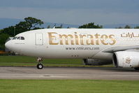 A6-EKX @ EGCC - Emirates - by Chris Hall