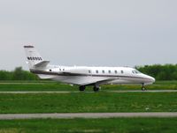 N689QS @ KAXN - Cessna 560XL Citation Excel taxiing to runway 31. - by Kreg Anderson
