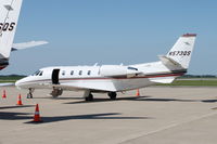 N573QS @ KCID - Photographed through a chain-link fence - on the Landmark ramp. - by Glenn E. Chatfield