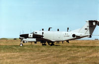 85-0154 @ EGQS - RC-12K Huron, callsign Argus 2 Alpha, of 1st Military Intelligence Battalion awaiting clearance to join the active runway at RAF Lossiemouth in September 1994. - by Peter Nicholson