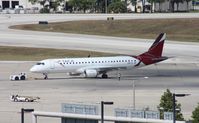 N983TA @ MCO - Taca E190 - by Florida Metal