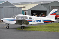 G-BNXU @ EGAD - Parked for the fly-in - by Robert Kearney