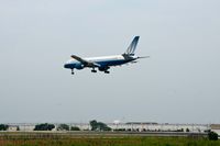 N529UA @ KORD - Landing OHare 4R - by Patrick Sullivan