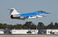 N104RB @ TIX - Starfighters Inc F-104 - by Florida Metal