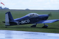 G-IMCD @ EGBK - arriving in the rain at AeroExpo 2011 - by Chris Hall