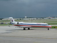 N642AE @ ORD - American Eagle Embraer EMB-145LR taxiing at Chicago O'hare Airport - by David Burrell