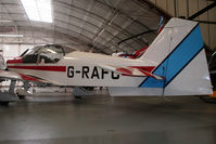 G-RAFC @ EGSF - Crammed in a hangar - by N-A-S