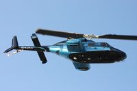 N145RC - Bell 230 leaving Heliexpo Orlando - by Florida Metal
