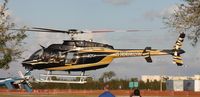 N330BC - Bell 407 leaving Heliexpo Orlando - by Florida Metal