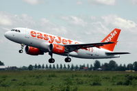 G-EZEI @ EHAM - EasyJet A319 taking off from Schiphol airport. - by Henk van Capelle