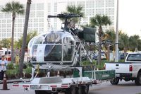 N55963 - Evergreen SA315B leaving Heliexpo Orlando on a trailer - by Florida Metal