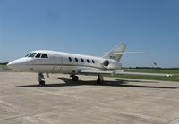 N620A @ KAXN - Dassault Falcon 20 on the ramp.