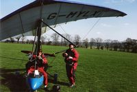 G-MYLX - John (pilot) and passenger preparing for flight from Haxted April 1995 - by Bill Palmer