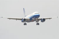 N815UA @ KORD - United Airlines Airbus A319-131, UAL380 arriving from Los Angeles, RWY 14R approach KORD. - by Mark Kalfas