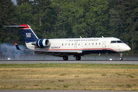 N213PS @ ORF - US Airways Express (PSA Airlines) N213PS (FLT JIA2547) from Philadelphia Int'l (KPHL) landing RWY 23.