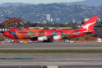 VH-OEJ @ LAX - Qantas VH-OEJ Wunala Dreaming under tow to remote parking.