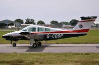 G-CBBF @ EGHH - Taken from the Flying Club - by planemad