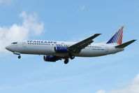 EI-DNM @ EGLL - Transaero 1989 Boeing 737-4S3, c/n: 24166 at Heathrow - by Terry Fletcher