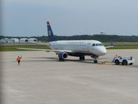 N138HQ @ ILM - On push back with what appears to be a cessna in the backround - by Mlands87