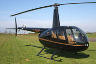 G-MAXZ @ EGBR - Robinson R44 Raven at Breighton Airfield in April 2011. - by Malcolm Clarke