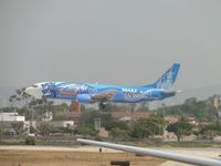 N706AS @ LAX - Disneyland/Make A Wish 737 on final for landing on runway 24R - by Helicopterfriend