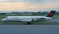 N8888D @ KABE - This Delta Connection (Pinacle Airlines) CRJ patiently awaits a free gate at Lehigh Valley International Airport.  This aicraft would eventually take me on the first leg of my journey to Minneapolis on a flight to Detroit. - by Daniel L. Berek