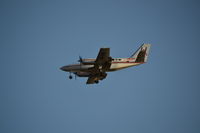 VH-HVR @ YPDN - Hardy Aviation Cessna 404 landing Darwin - by Jim Burrow